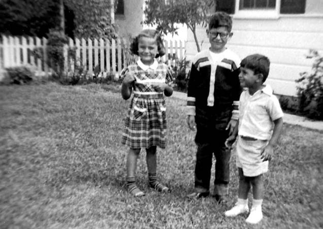 carlos, little boy on the right, beloved brother...